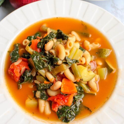Vegan minestrone soup in a white bowl
