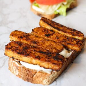 Smoky tempeh on a piece of bread