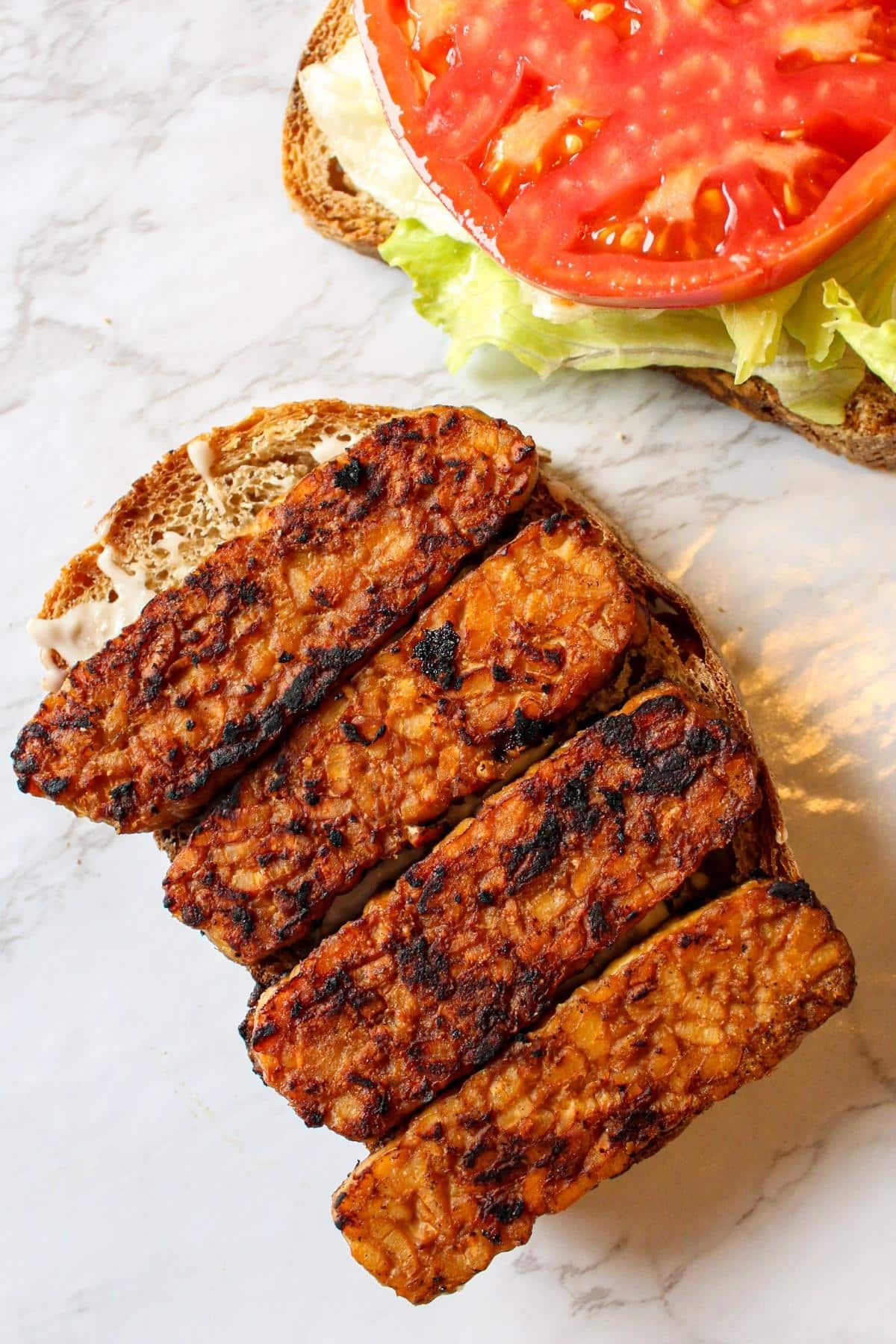 Smoky tempeh on a piece of bread
