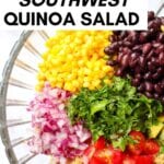 Quinoa black bean salad in a glass serving bowl.