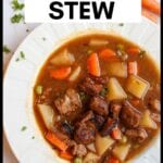 bowl of vegan beef stew with test overlay for pinterest