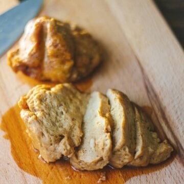 Seitan on a cutting board sliced