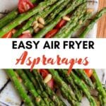 Roasted air fryer asparagus on a plate with cherry tomatoes