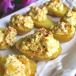 Serving tray filled with vegan deviled eggs