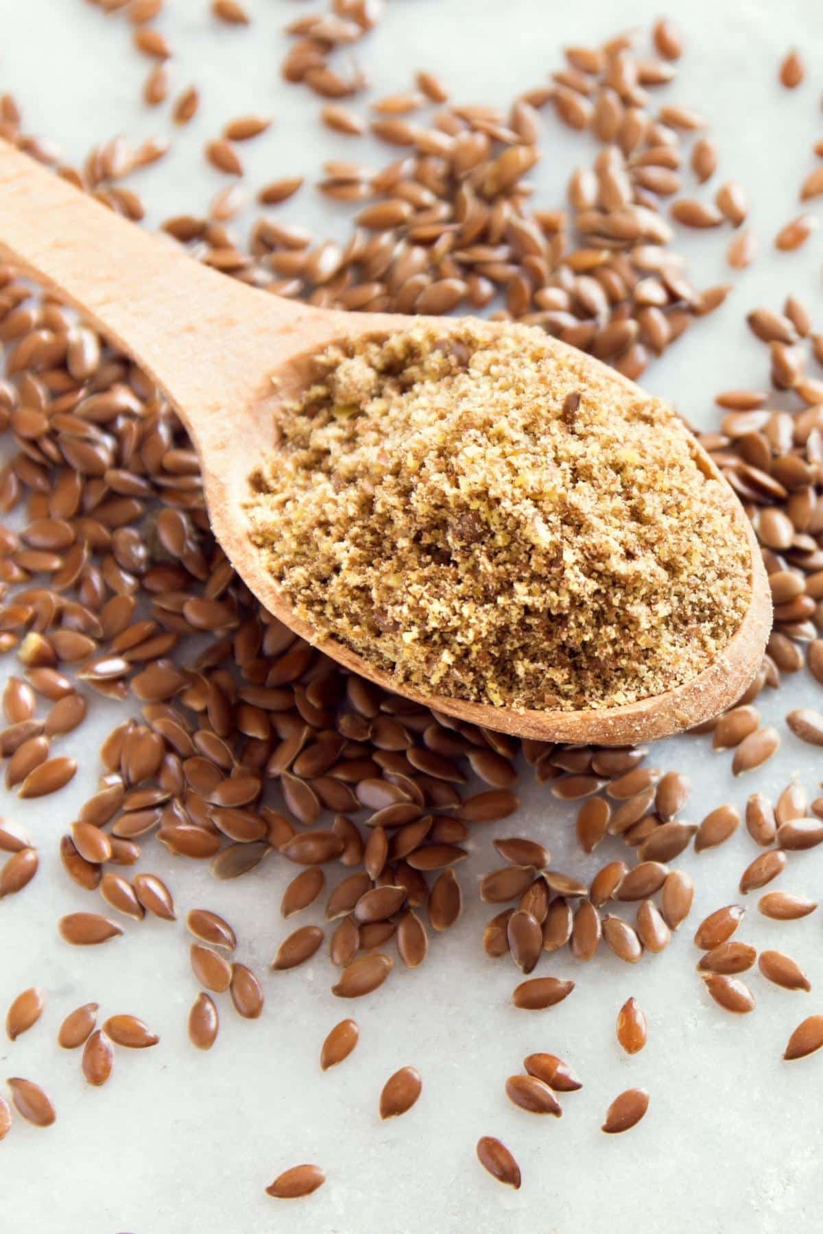 Ground flax seeds in a wooden spoon