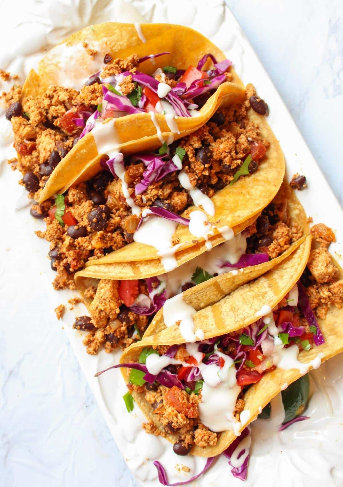Tofu ground beef tacos on a serving platter