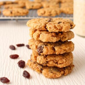 Vegan oatmeal cookies stacked on top of each other