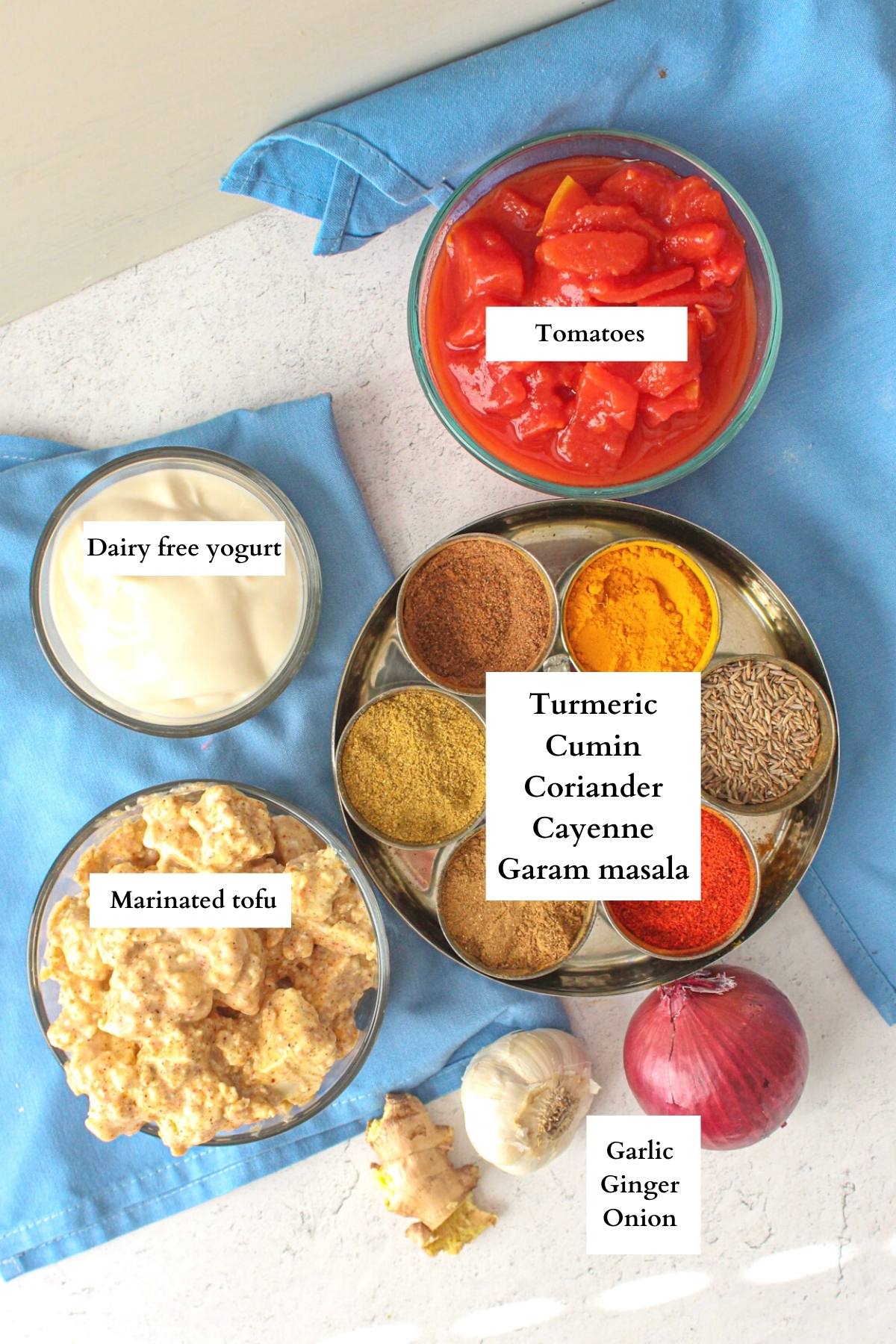 Vegan tikka masala ingredients laid out on a table