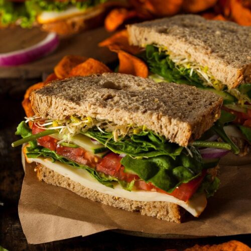 Vegan panera bread sandwich cut in half
