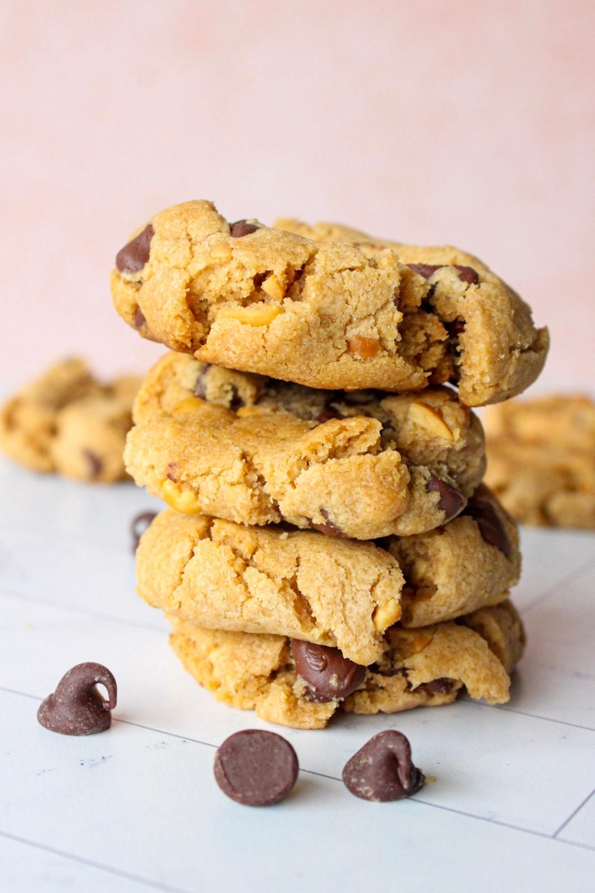Vegan peanut butter chocolate chip cookies stacked on top of each other