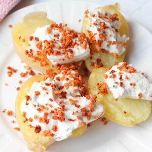 Baked potatoes topped with vegan bacon bits