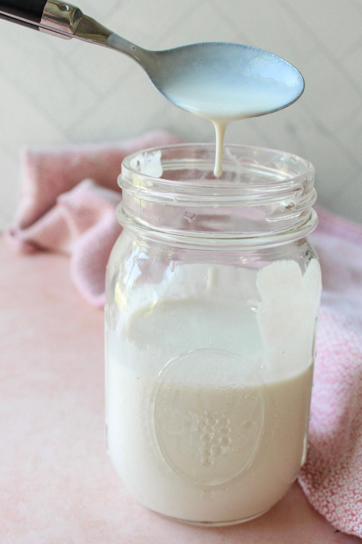 Homemade Vegan cream in a small glass mason jar.