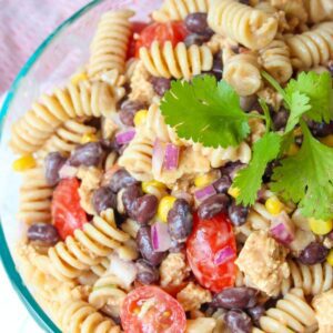 Vegan taco pasta salad in a glass serving bowl.