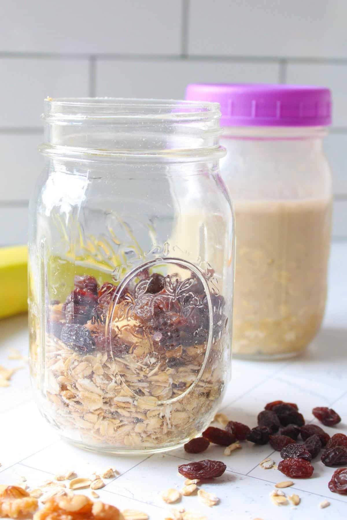 Protein overnight oats ingredients in a glass mason jar.