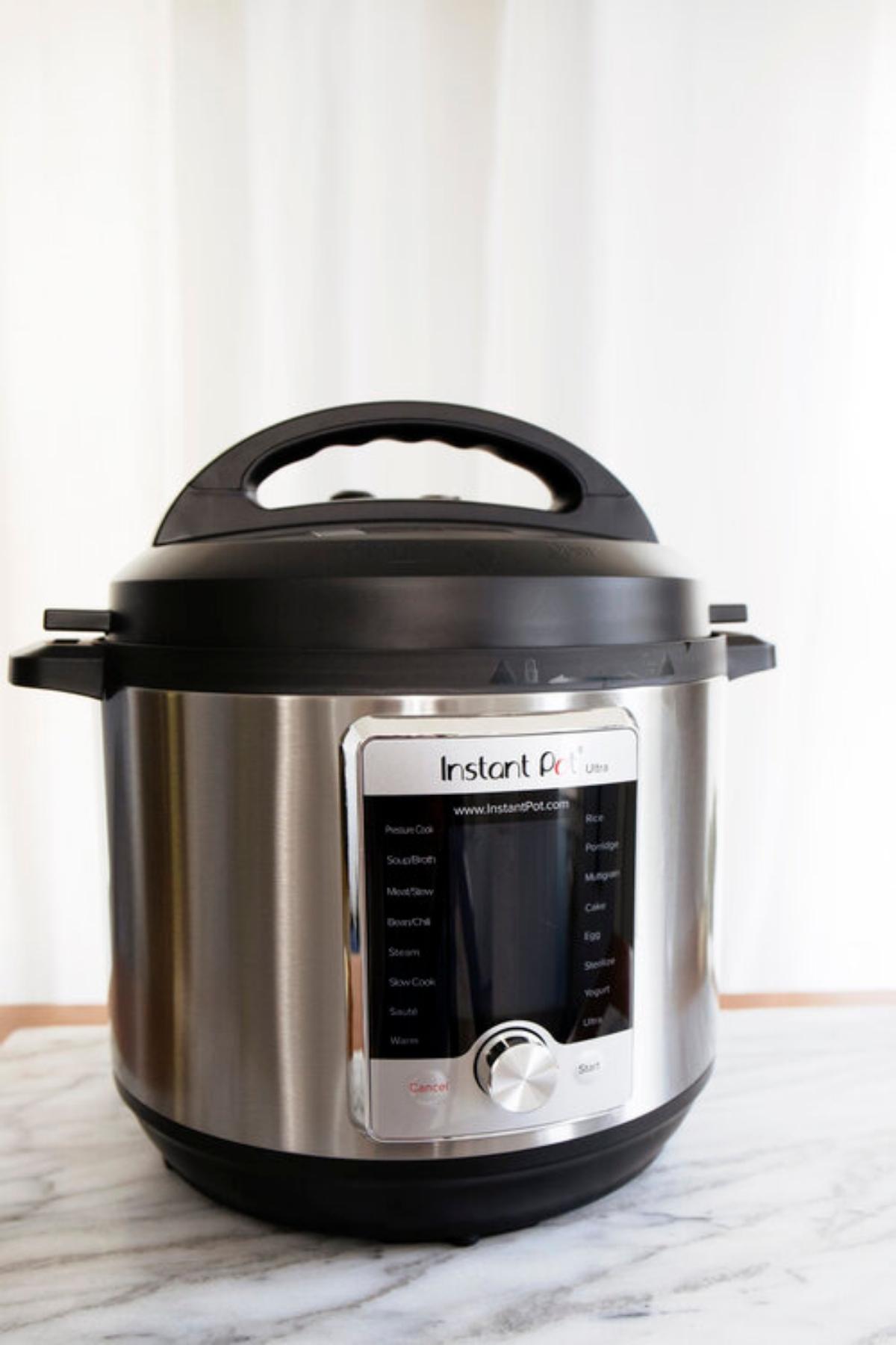 Instant pot pressure cooker sitting on a counter