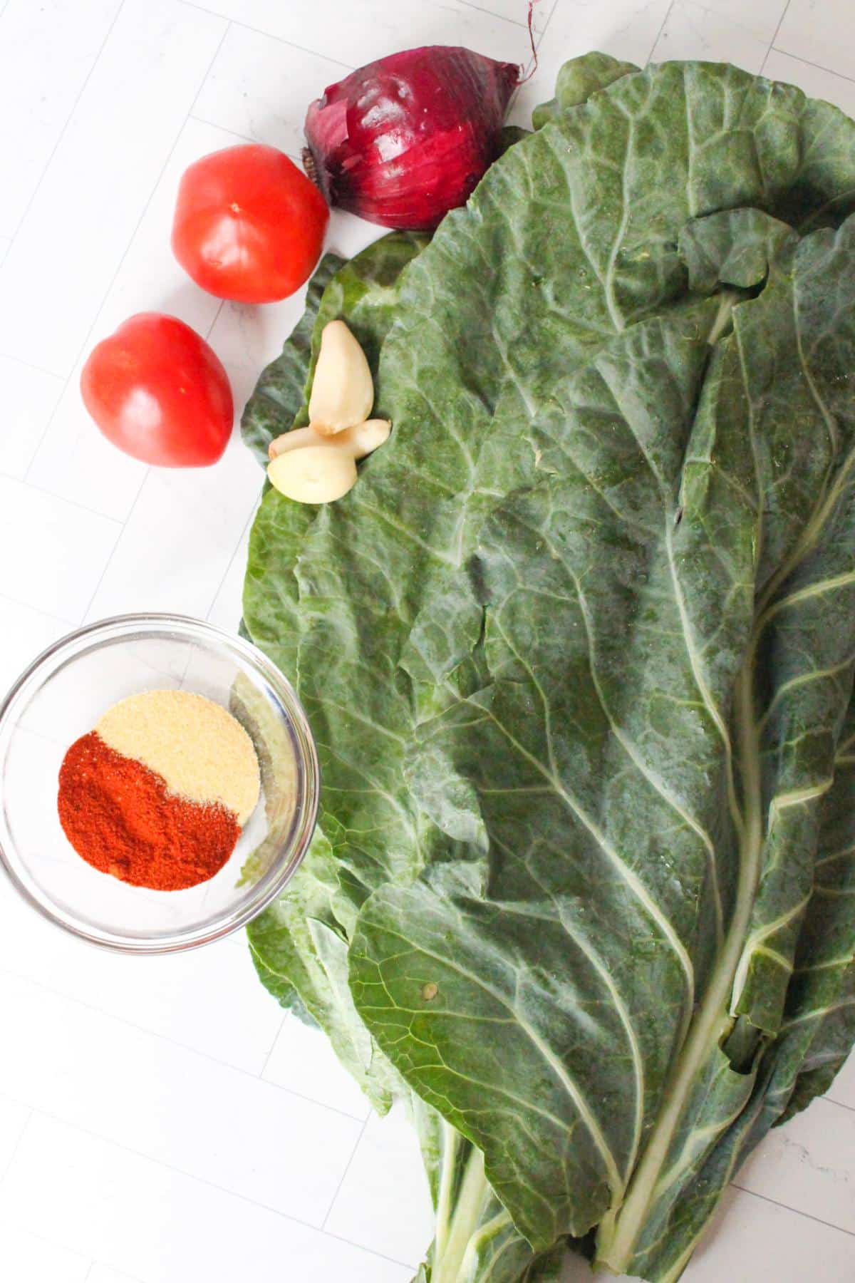 Vegan collard green ingredients laid out on a table