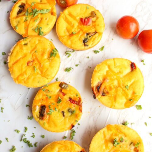 Vegan mini quiche cups laying on a counter.