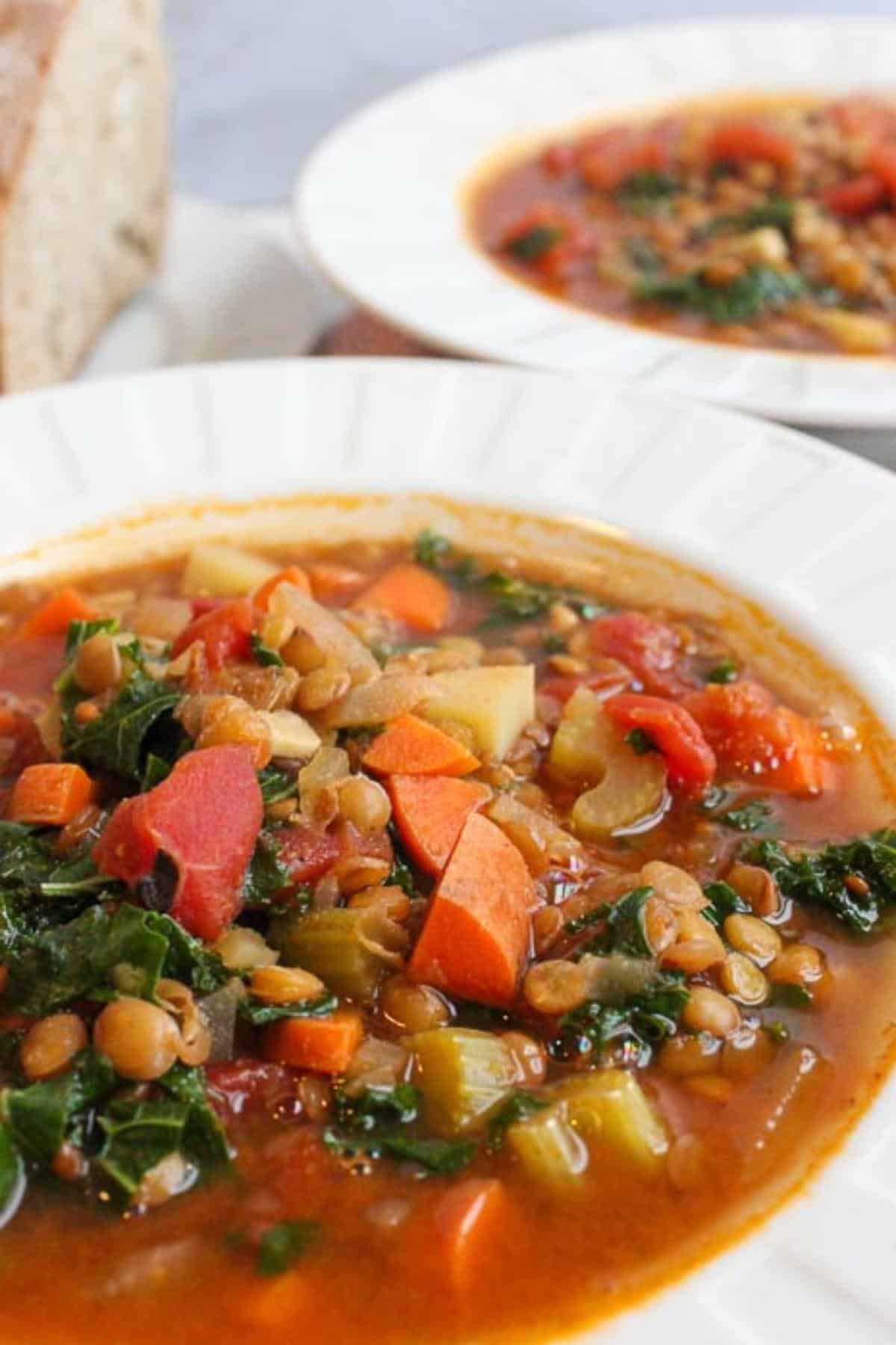 Vegan lentil vegetable soup in a bowl.