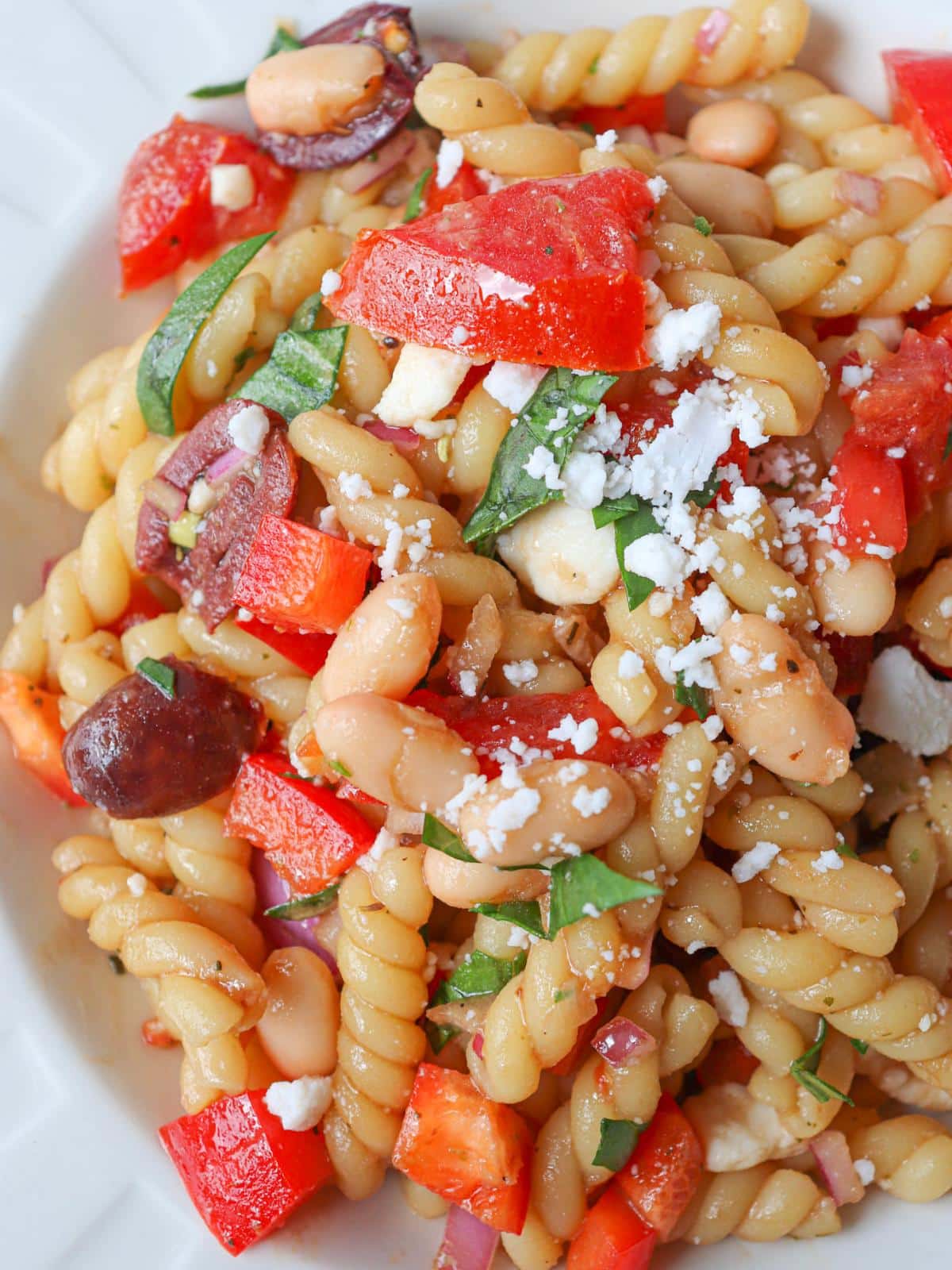 Balsamic pasta salad in a white bowl.