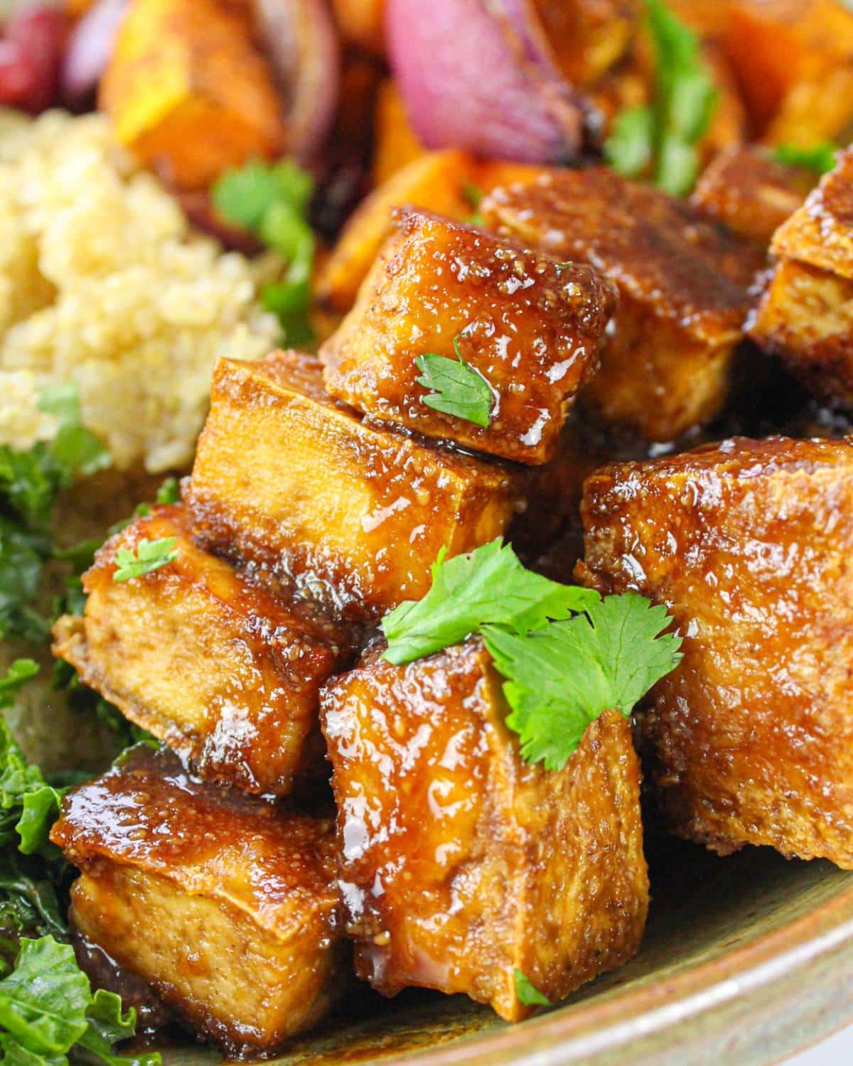 Close up of peanut tofu in quinoa tofu bowl.