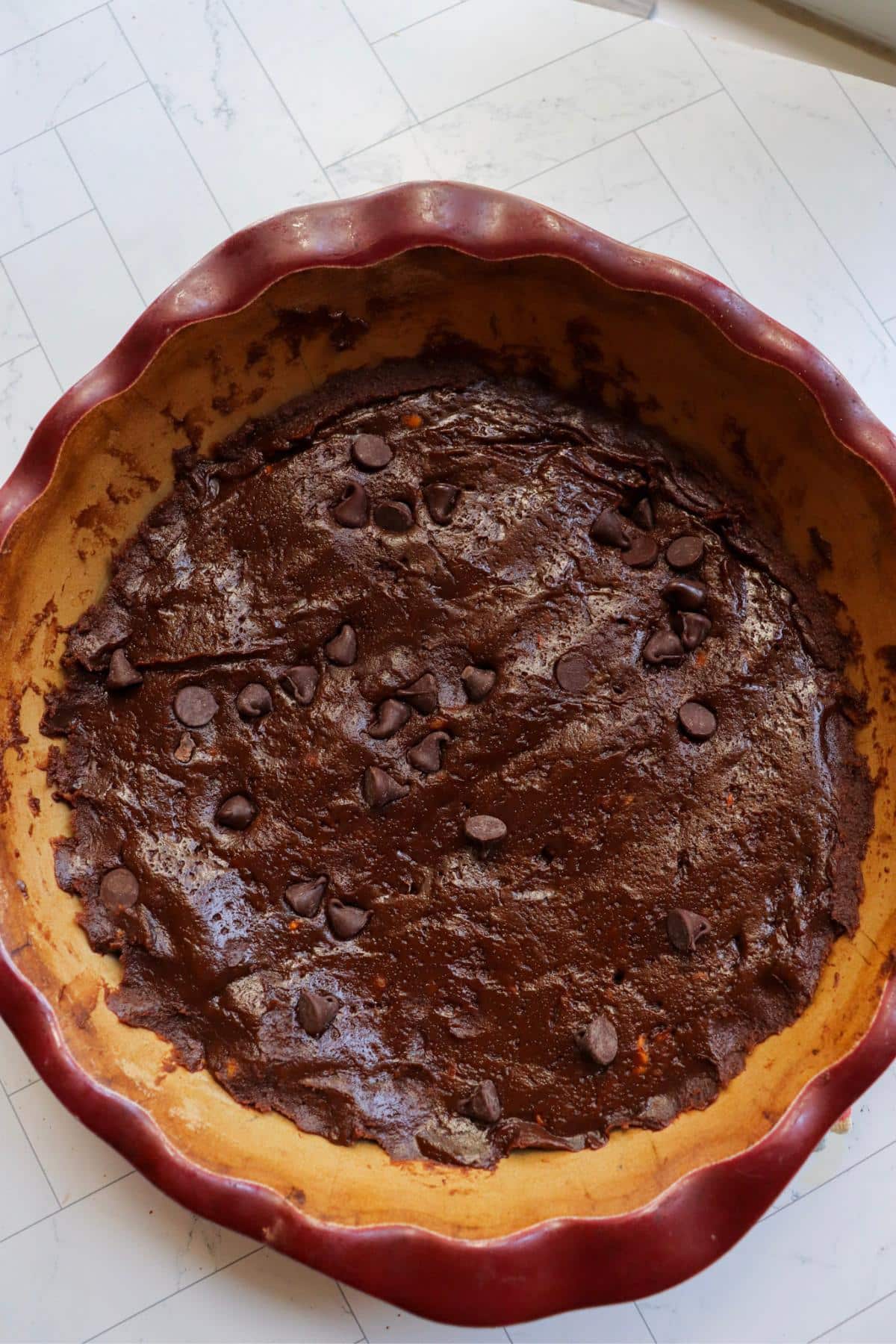 Sweet potato brownie batter in a baking dish.