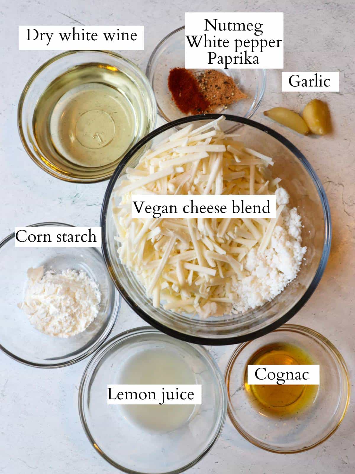 Ingredients for vegan fondue laid out on a counter top.